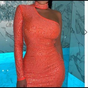 Show stopping orange one shoulder dress. Brand new